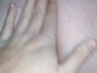 Inserting her anal plug