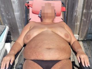 Mature wife enjoying the sun. 5 of 8