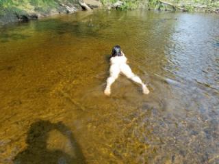 Posing nude in the river 4 of 13