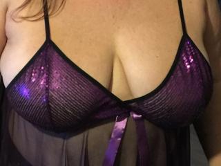 Heather in her purple nightie and enjoying her purple vibrator 13 of 20