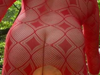 My red slut in a red bodystocking outdoor. Part1 3 of 10
