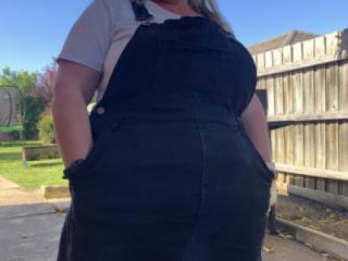 Out and about in her pinafore 6 of 8