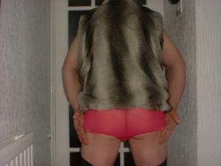 Fur coat, stockings and pink panties 6 of 7