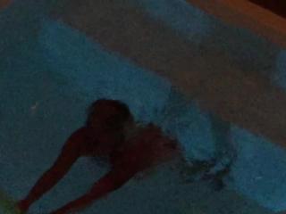 Hot Blonde Milf having fun in the pool