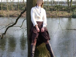 Young wife flashing in the city park 16 of 20