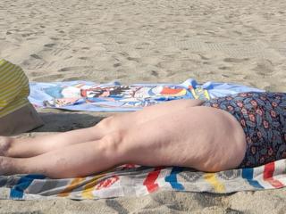 Eve in swimsuit on the beach this summer 1 of 8