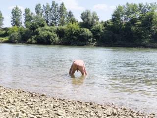 I bathe naked in the river 6 of 11