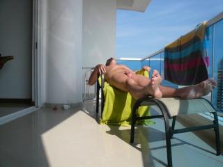 Nude sun bathing 2 of 8