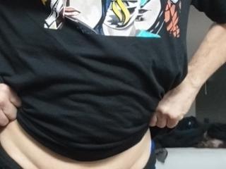 Wearing my kiss shirt and flexing my little muscle 5 of 8