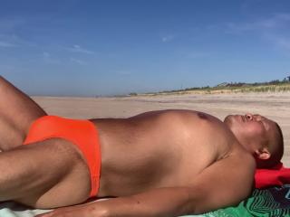 Watch me sunbathe in Cherry Grove, Fire island orange bikini