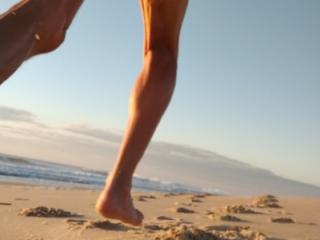 Celebrating 66 with a nude run on the beach. 3 of 10