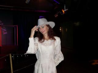 In Wedding Dress and White Hat on stage 19 of 20