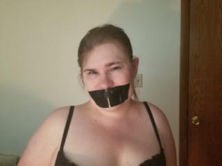 Tied spread eagle and facial in black bra and panties 10 of 20