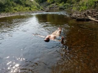 Posing nude in the river 11 of 13
