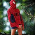 Spiderman spins a sticky web
