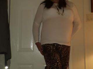 White shirt and leopard pants 10 of 12
