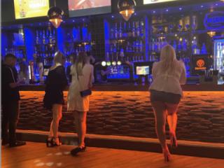 A quick guide on how to walk and stand at a bar 9 of 10