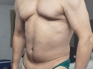 Old guy and his small muscle flexing 9 of 11
