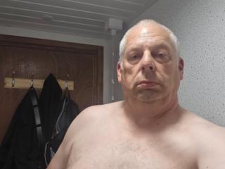 A fat man in the shower
