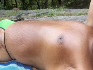 Sunbathing in Park Green G-string 12 of 15