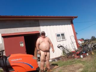 Mowing  in Birthday suit outside 5 of 8