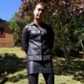Crossdresser in leather skirt and lea...