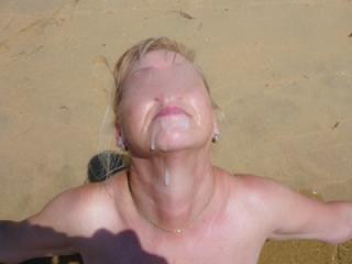 cum dripping of my face at beach 2 of 4