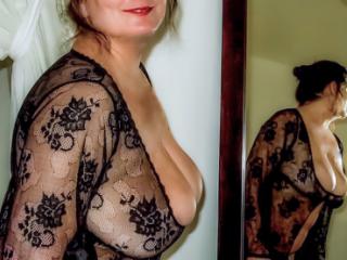 Big breasts in black lace 9 of 15