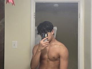 Muscular Asian and his dick pic