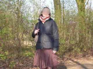 Young wife flashing in the city park 3 of 20