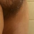 Taking a shower and shaving my legs