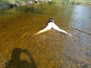 Posing nude in the river 5 of 13