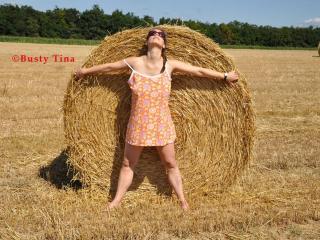 Busty Tina - The hay bale 1 of 10