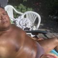 Sunbathing in my backyard in brown th...