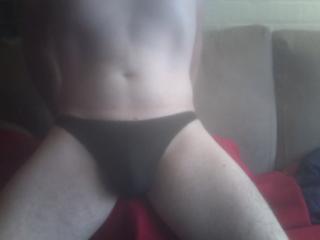 Erection in a black thong. 2 of 14