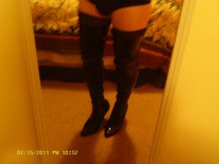 Boy shorts, leather thigh high boots 2 of 9