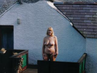 Nude mature photographed by watcher using telephoto lens 4 of 9