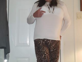 White shirt and leopard pants 11 of 12