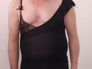 Sissy crossdresser wearing mini black dress 2 of 20