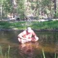 Naked in the creek.