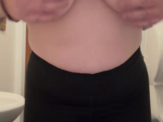 A cheeky boob flash while at work