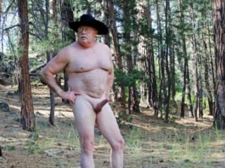 Naked on foot in the pine forest. 1 of 4