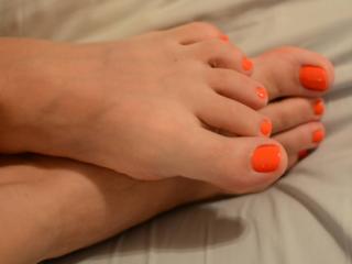 Sexy feet with orange toes 3 of 6