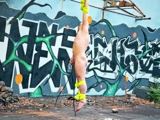 Self whipped suspended naked in the park until orgasm