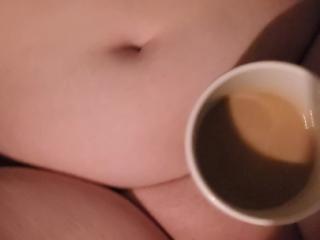 Enjoying 2 of my favorite things pussy and coffee to start my day