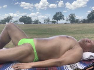Sunbathing in Bayonne Park in my Green bikini 6 of 11