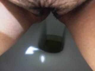 Pissing in a public restroom 6 of 7