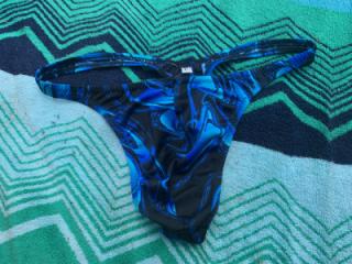 Sunbathing in Bayonne Park Blue pattern string thong 9 of 20