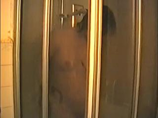 Yvonne takes a shower