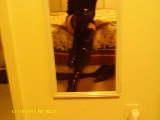 Boy shorts, leather thigh high boots 9 of 9